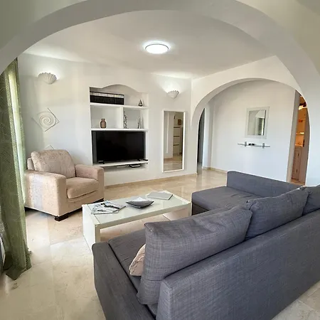 Апартаменты Sunset En Oasis Tropical *