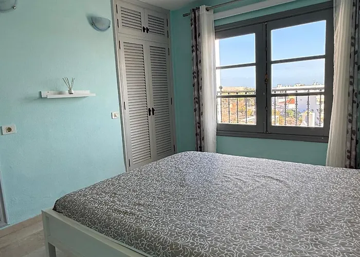 Апартаменты Sunset En Oasis Tropical Кальяо-Сальвахе