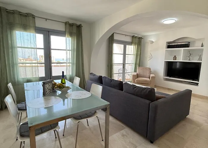 Апартаменты Sunset En Oasis Tropical *